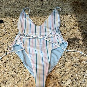Elysiian one piece, size medium